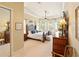 Inviting main bedroom with tray ceiling, large windows, and lots of space for relaxation and rest at 128 Godfrey Rd, Edgewater, FL 32141
