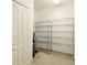 Walk-in closet featuring wire shelving for optimal storage and organization at 128 Godfrey Rd, Edgewater, FL 32141