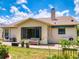 Relaxing backyard space featuring a patio, well-kept lawn, and serene outdoor ambiance at 1307 Wayne Ave, New Smyrna Beach, FL 32168