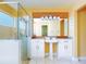 Bright bathroom with glass shower, bright lighting, and a pedestal sink at 1307 Wayne Ave, New Smyrna Beach, FL 32168