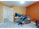 Office with a window, ceiling fan, desk, and computer at 1307 Wayne Ave, New Smyrna Beach, FL 32168