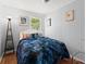 Serene bedroom featuring a queen-sized bed, soft lighting, and coastal-themed decorations, creating a peaceful retreat at 135 12Th St, Daytona Beach, FL 32117
