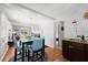 Bright dining room with a modern table set, adjacent to the kitchen and living area, perfect for gatherings at 135 12Th St, Daytona Beach, FL 32117