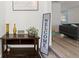Inviting entryway with dark wood table, decor, and a glimpse into the living area beyond at 135 12Th St, Daytona Beach, FL 32117