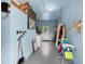 Functional utility room features a washing machine and ample space for storage and other utilities at 135 12Th St, Daytona Beach, FL 32117