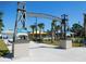 Edgewater's Whistle Stop Park boasts a splash pad and more under a sunny sky at 1627 Umbrella Tree Dr, Edgewater, FL 32132