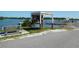 Boat dock provides access to the water with life jacket loaner station and picnic tables at 1627 Umbrella Tree Dr, Edgewater, FL 32132