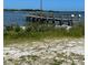 Community fishing pier to enjoy the scenery and catch local fish at 1627 Umbrella Tree Dr, Edgewater, FL 32132