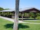Enjoy a covered picnic area with tables and grills for outdoor gatherings at 1627 Umbrella Tree Dr, Edgewater, FL 32132