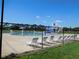Community pool with splash pad and seating area, perfect for summer fun and relaxation at 1627 Umbrella Tree Dr, Edgewater, FL 32132