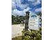 Community sign at Whistle Stop Park featuring a splash pad, skate park, restroom, and playground at 1627 Umbrella Tree Dr, Edgewater, FL 32132