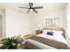 Bright bedroom with neutral decor, light wood floors, and ample natural light at 1674 Coulter Ln, Port Orange, FL 32129