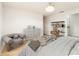 Charming bedroom featuring a gray accent chair and modern decor at 1674 Coulter Ln, Port Orange, FL 32129
