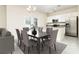 Open concept dining area, connected to the kitchen, provides ample space for entertaining and Gathering meals at 1674 Coulter Ln, Port Orange, FL 32129
