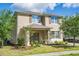 Charming two-story home with a well-maintained front lawn and inviting curb appeal at 1674 Coulter Ln, Port Orange, FL 32129