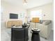 Bright living room with neutral tones, modern furnishings and decor at 1674 Coulter Ln, Port Orange, FL 32129