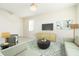 Bright living room with neutral tones and modern furnishings and decor at 1674 Coulter Ln, Port Orange, FL 32129