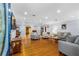 Bright living room featuring hardwood floors, recessed lighting, and comfortable seating at 1786 Taylor Rd, Port Orange, FL 32128