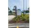 Community sign directing residents to the skate park, splash pad, and restroom at 1830 Needle Palm Dr, Edgewater, FL 32132