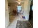 Bright kitchen with tile flooring, a dining table, and modern appliances, creating a cozy and functional space at 1830 Needle Palm Dr, Edgewater, FL 32132