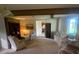 Cozy living room featuring carpet, a ceiling fan, and comfortable seating at 1830 Needle Palm Dr, Edgewater, FL 32132