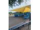 Community playground with play train and a shade sail at 1830 Needle Palm Dr, Edgewater, FL 32132