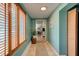Inviting hallway featuring warm natural light and a view to other living spaces in the home at 184 Azalea Rd, Edgewater, FL 32141
