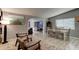 Open concept living room with dining area, modern decor, and ample natural light at 184 Azalea Rd, Edgewater, FL 32141