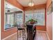 Comfortable dining area filled with natural light, cozy seating, and views of the outdoors at 1840 Tara Marie Ln, Port Orange, FL 32128