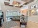 Cozy living room featuring a sectional sofa, unique ceiling design, and open layout at 1840 Tara Marie Ln, Port Orange, FL 32128