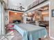 Bright living room with a pool table that connects to other living spaces and an abundance of natural light at 1840 Tara Marie Ln, Port Orange, FL 32128