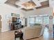 Comfortable living room with a fireplace, plush seating, and an open layout, perfect for relaxation at 1840 Tara Marie Ln, Port Orange, FL 32128