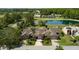 An aerial view showcasing the townhome's proximity to a tranquil lake at 1903 Sprucewood Way, Port Orange, FL 32128