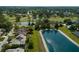 Aerial view of home nestled in a community with a beautiful lake at 1903 Sprucewood Way, Port Orange, FL 32128
