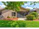 A cozy backyard with a screened lanai and well-maintained landscaping at 1903 Sprucewood Way, Port Orange, FL 32128