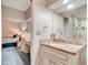 Bright bathroom with granite vanity top, glass shower, and bedroom view showcasing modern design at 1903 Sprucewood Way, Port Orange, FL 32128