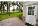 Enjoy this lovely backyard view with mature trees and landscaping backing up to the beautiful pond at 1903 Turnbull Lakes Dr # 1903, New Smyrna Beach, FL 32168