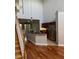 View of an open-concept kitchen with stainless steel appliances and dark wood cabinets at 1903 Turnbull Lakes Dr # 1903, New Smyrna Beach, FL 32168