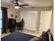 Bedroom with closet, window, ceiling fan, and desk area for gaming or studying at 208 Wellington Dr, Daytona Beach, FL 32119