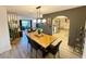 Open concept dining area flowing into the living room and kitchen, perfect for Gathering gatherings at 208 Wellington Dr, Daytona Beach, FL 32119