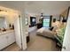 Comfortable main bedroom with a modern design, ensuite bathroom, and cozy ambiance at 208 Wellington Dr, Daytona Beach, FL 32119