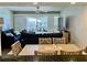 Cozy living room with comfortable seating and sliding glass doors to a private patio at 2100 N Peninsula Ave # 2160, New Smyrna Beach, FL 32169