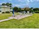 Inviting patio area with comfortable seating, perfect for relaxing outdoors on a sunny day at 2100 N Peninsula Ave # 2160, New Smyrna Beach, FL 32169