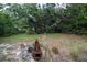 Backyard area with lush greenery, providing a private and serene environment at 2107 Saxon Dr, New Smyrna Beach, FL 32169