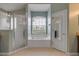 Bathroom featuring a shower, a soaking tub under a window, and vanity with a mirror at 2435 Alton Rd, Deltona, FL 32738
