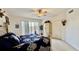 Light bedroom with access to a large balcony and exterior views at 250 Minorca Beach Way # 206, New Smyrna Beach, FL 32169