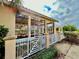 Community picnic pavilion surrounded by lush greenery, a perfect spot for outdoor gatherings at 250 Minorca Beach Way # 206, New Smyrna Beach, FL 32169