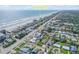 Aerial view showcasing the home's proximity to the beach in a coastal neighborhood at 2510 S Atlantic Ave, New Smyrna Beach, FL 32169