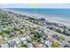 Aerial view of a neighborhood home close to the ocean and beautiful Florida beaches at 2510 S Atlantic Ave, New Smyrna Beach, FL 32169