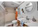 Cozy bathroom with a shower, stylish vanity, and tasteful decor at 2510 S Atlantic Ave, New Smyrna Beach, FL 32169